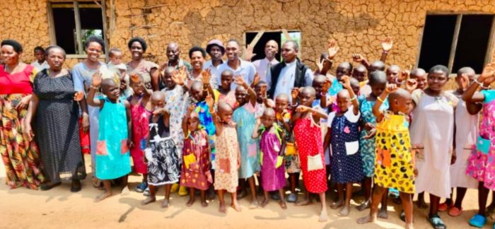 IMG_3883 A large group of young girls wearing dresses made by St.Mary's and the MAAP Foundation in Uganda.