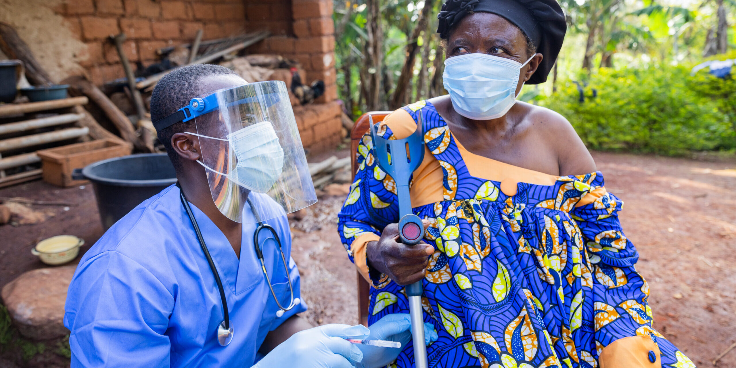 The village doctor visits a sick old woman and gives her an injection